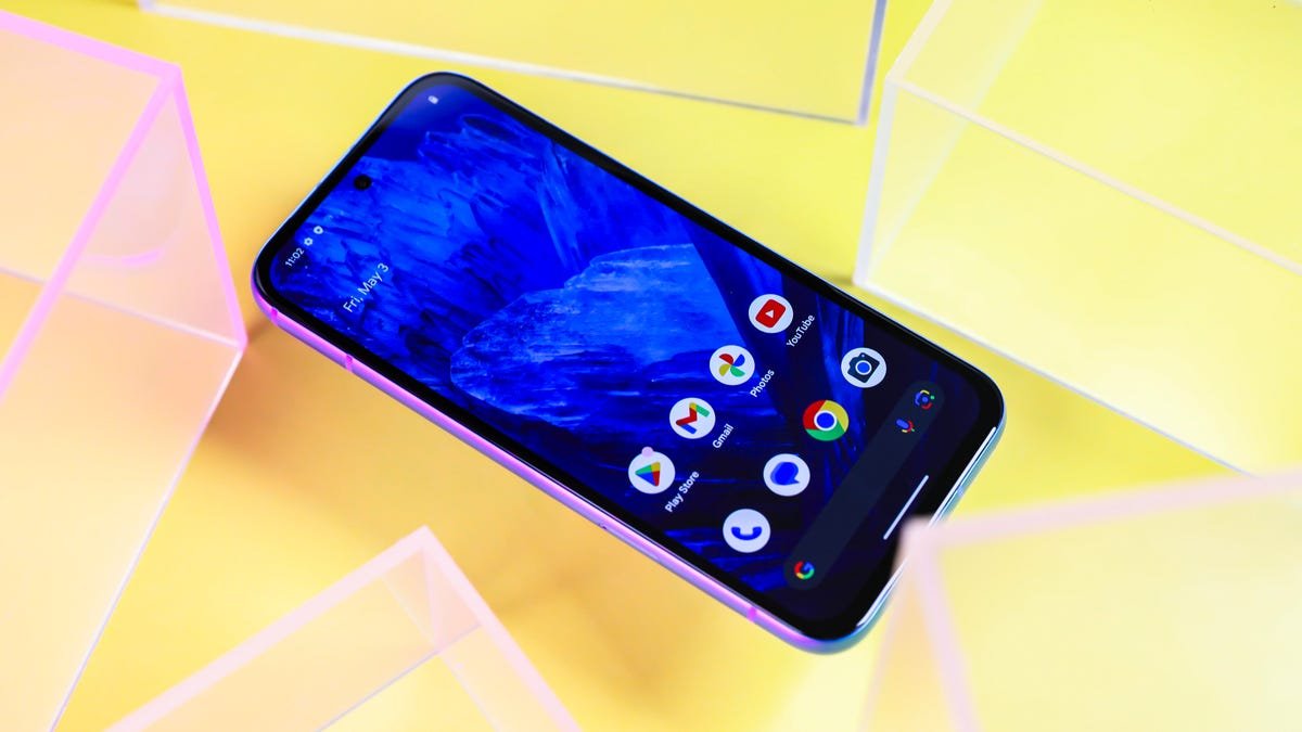 Google Pixel 8A Review: A Clear Choice Over the Pixel 8 30 Google's Pixel 8A on a yellow background
