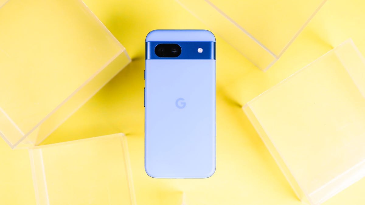 Google Pixel 8A Review: A Clear Choice Over the Pixel 8 28 The Pixel 8A against a yellow background