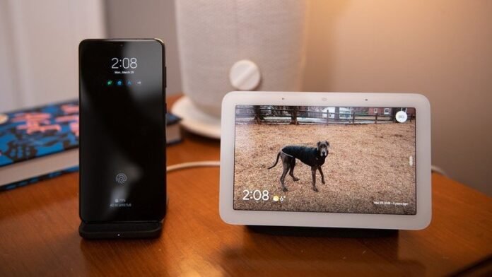 Nest Learning Thermostat could see a long-overdue refresh according to Nest Hub next to a phone