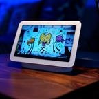 A Nest Hub (2nd gen) on a night table