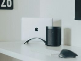 Users fear the Sonos app could require a subscription | Sonos speaker on a desk with a MacBook