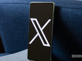 X logo on smartphone stock photo (aka Twitter) (1)