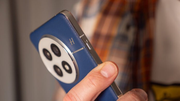 OnePlus is in hot water for something that all of The alert slider on the side of the blue OnePlus 13