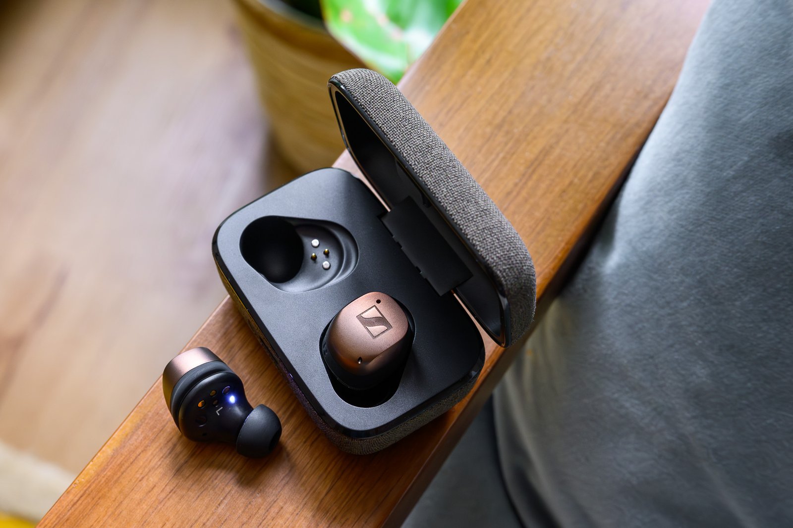 A photo of Sennheiser’s Momentum True Wireless 4 earbuds in copper.