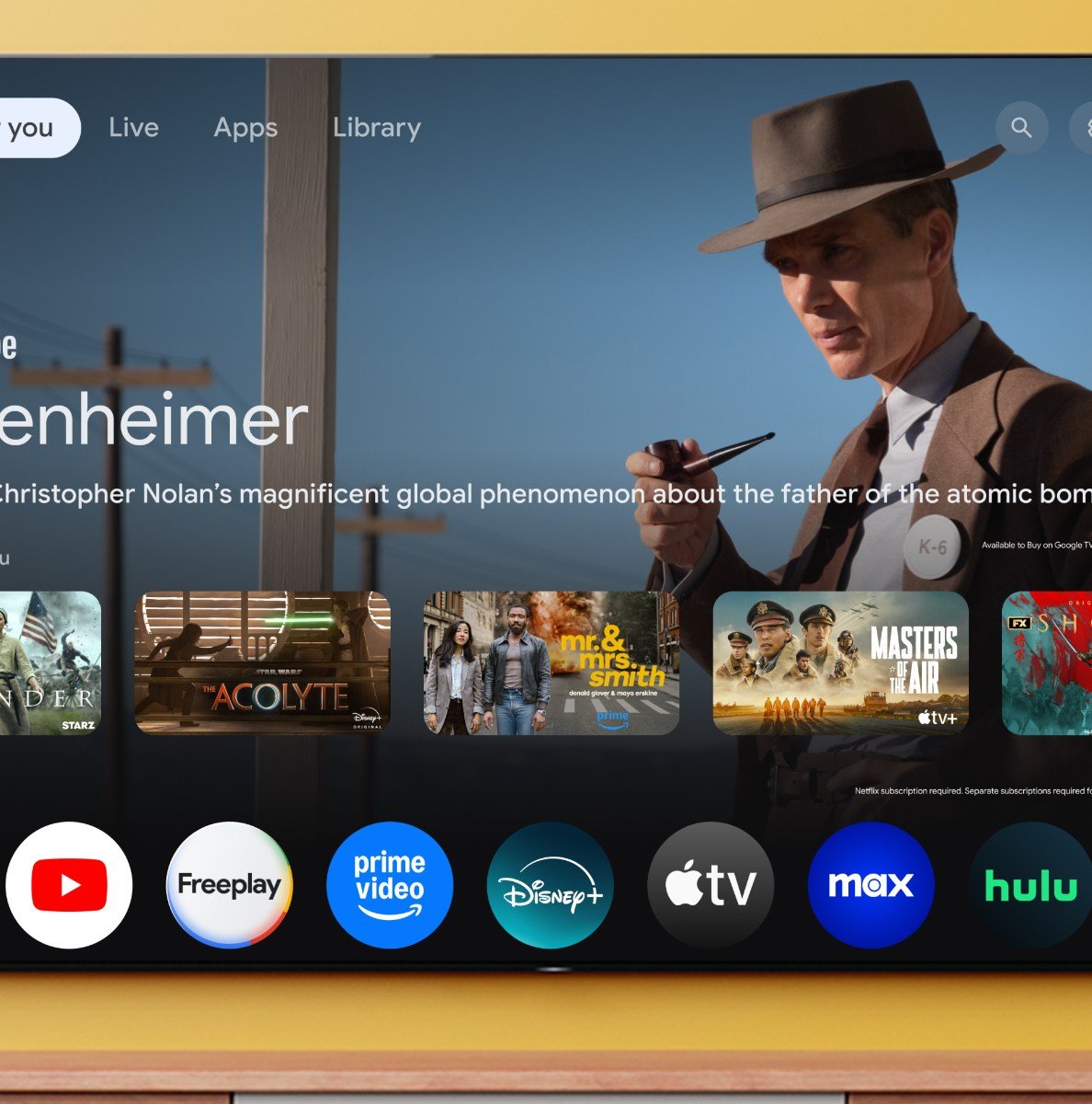 Sony’s Bravia 8 II mounted onto a wall on top of a media center.