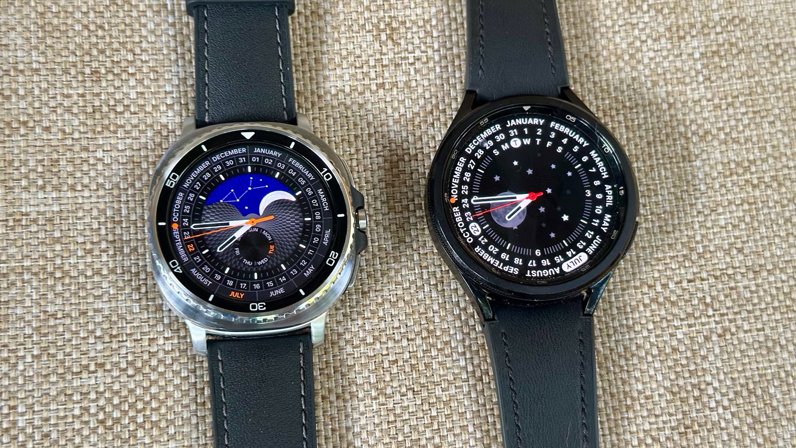 A top-down view of the Samsung Galaxy Watch 8 Classic (left) and Samsung Galaxy Watch 6 Classic (right), both with classic-style watch faces.