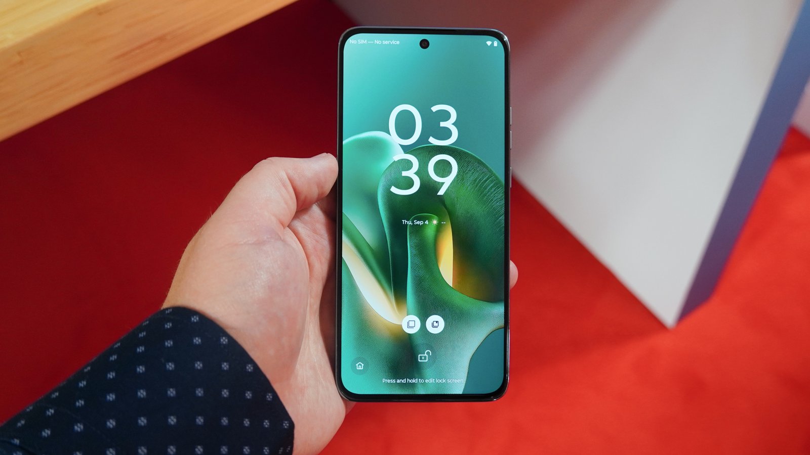 The Motorola Edge 60 Neo in the hand and on display at IFA 2025.