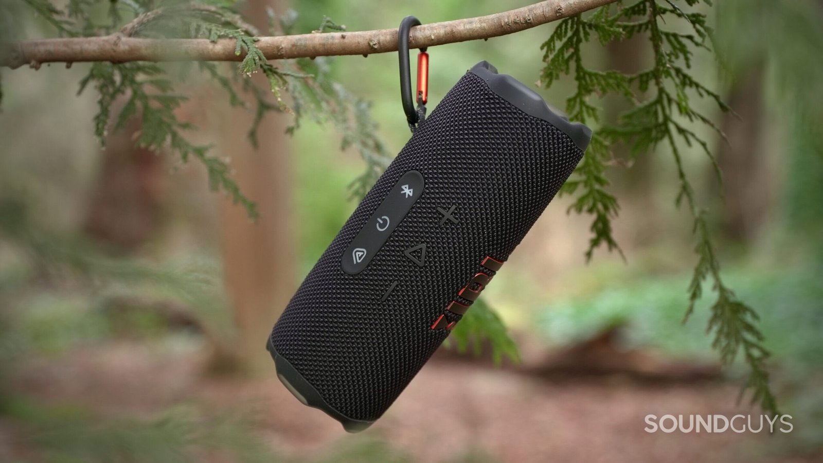 JBL Flip 7 hanging from tree branch