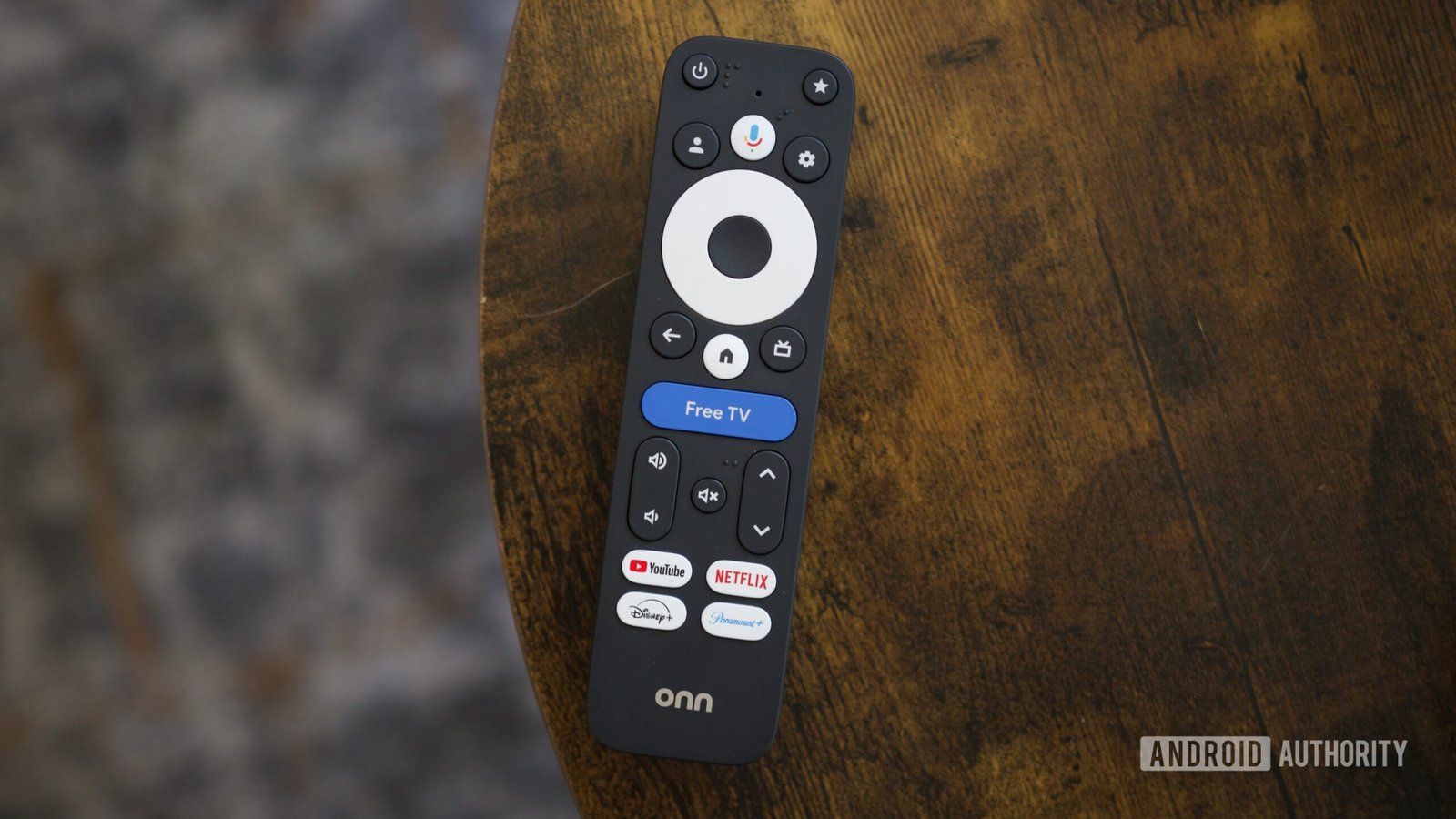 walmart onn 4k pro 2026 streaming box hands on 2 Walmart Onn 4K pro remote sitting on a table.