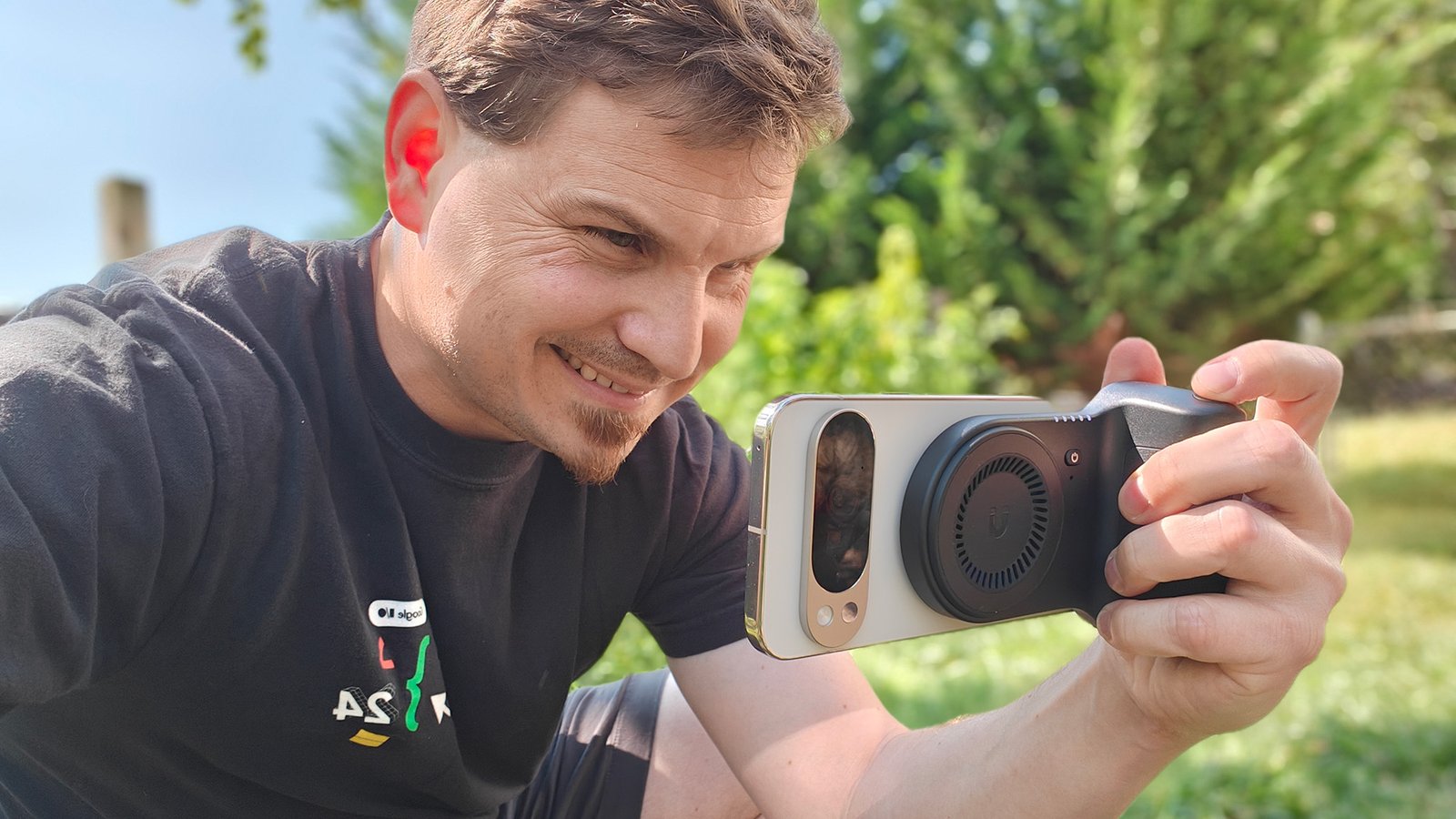 Google Pixel 11 Pro XL vs. Pixel 10 Pro XL 16 Using a KraftGeek magnetic camera grip attached to a Google Pixel 10 Pro XL to take a photo